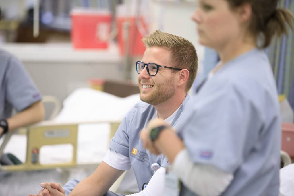 Incoming ABSN students work in the College of Nursing lab on June 03, 2019. Photo by Steven Bridges